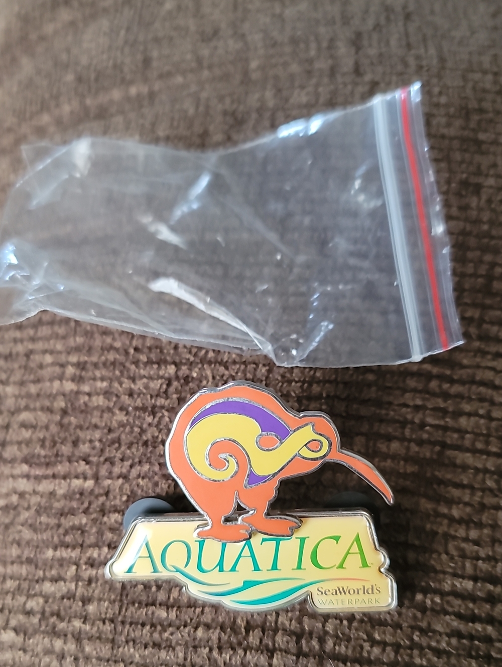 Aquatica SeaWorld Orange Kiwi Enamel Pin - Collectible Accessory